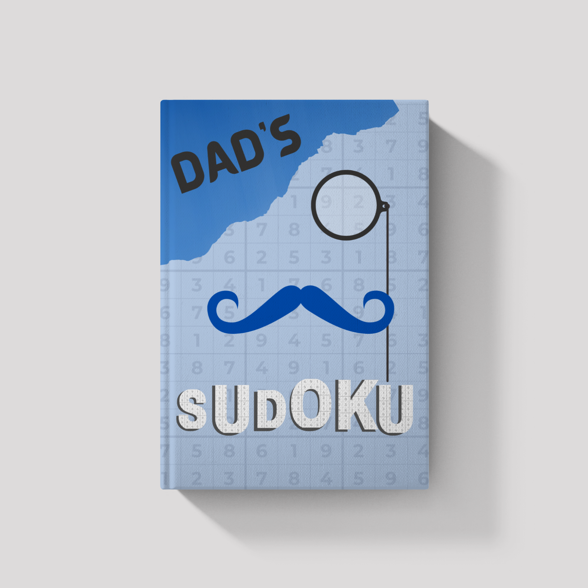 Sudoku book titled 'Dad's Sudoku' with a blue cover and mustache graphic on a light gray background