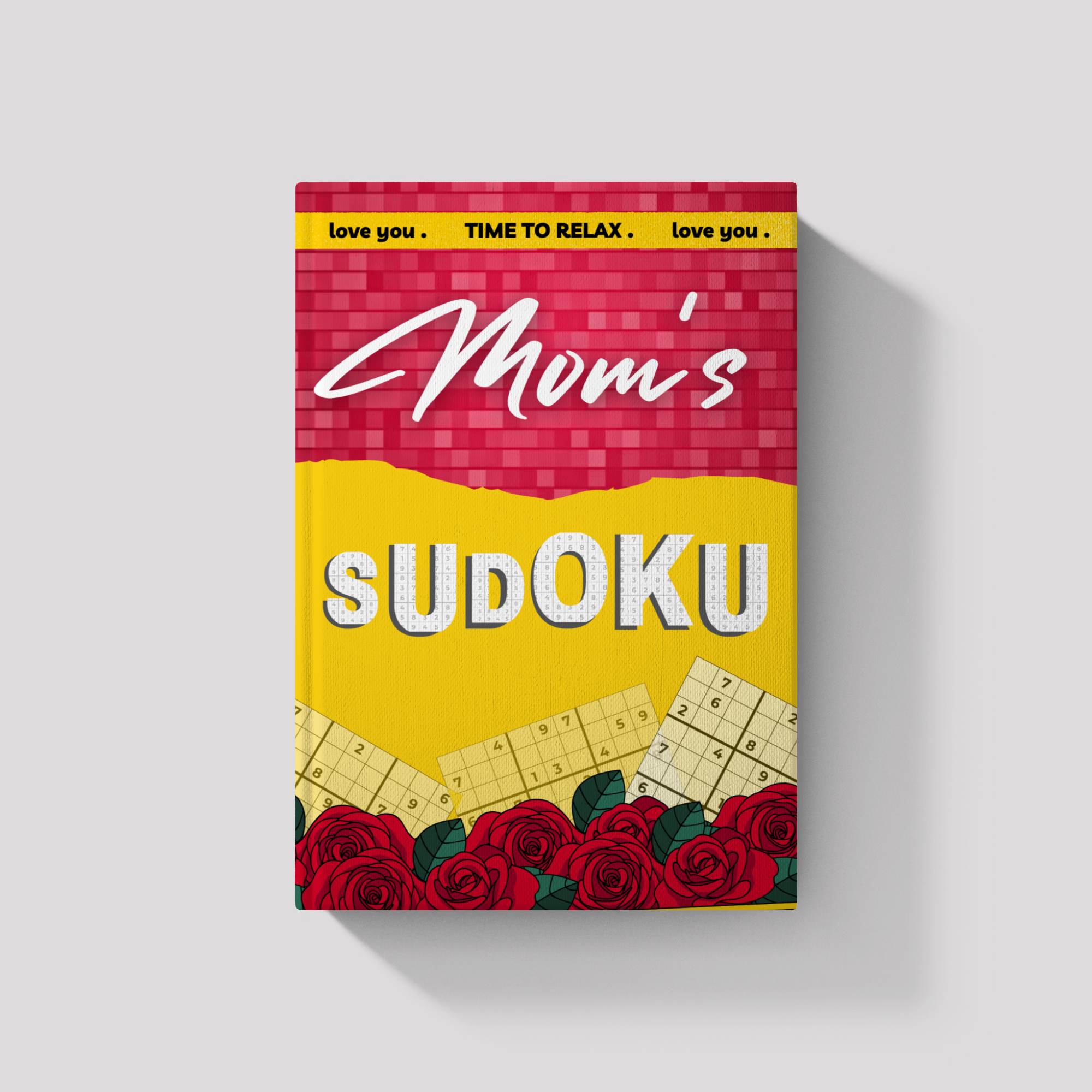 Sudoku book titled 'Mom's Sudoku' with red roses on a light gray background