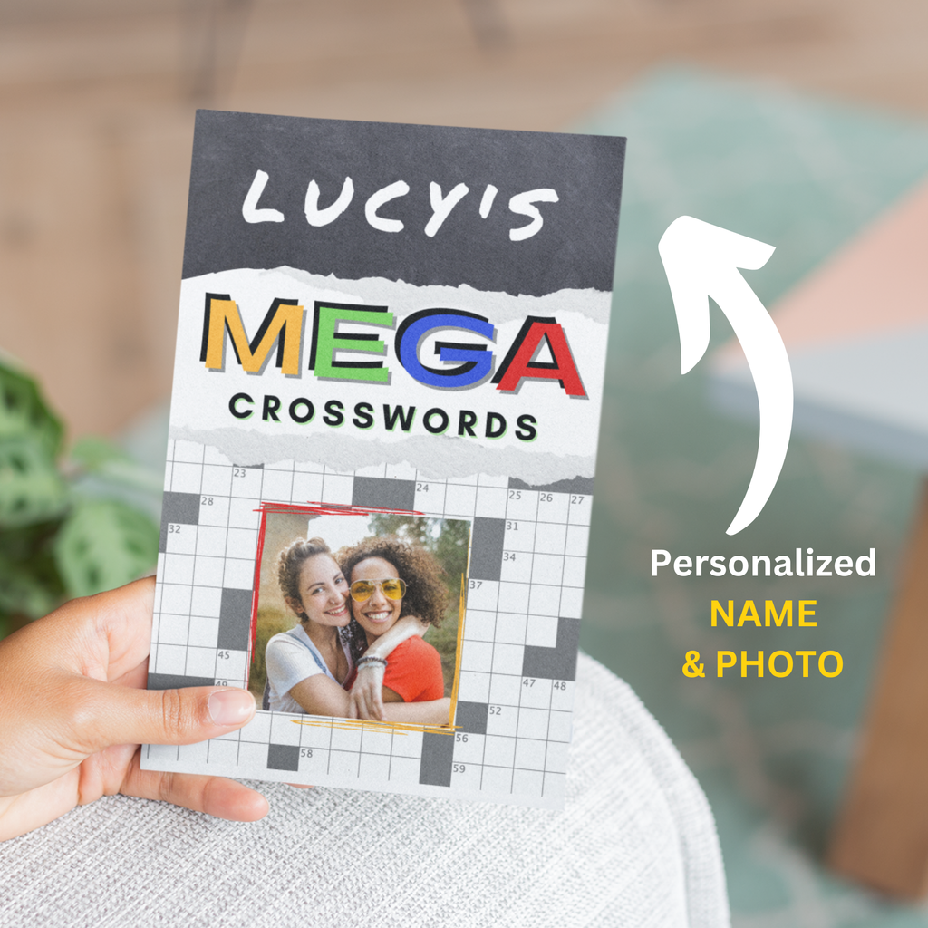 Personalized crossword book titled 'Mega Crosswords' in colorful letters held by a person with a blurred background.