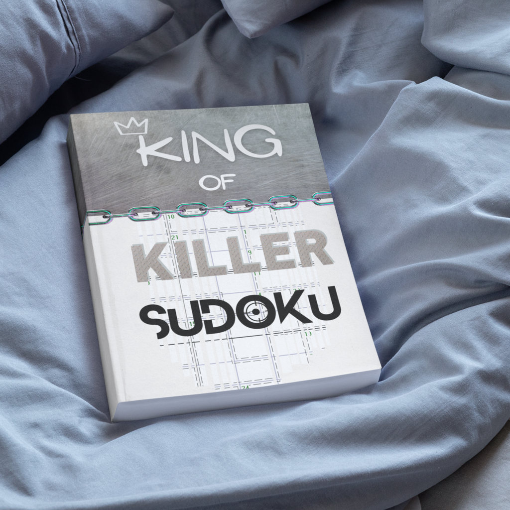 A book titled 'KING OF KILLER SUDOKU' placed on a light blue bed. 